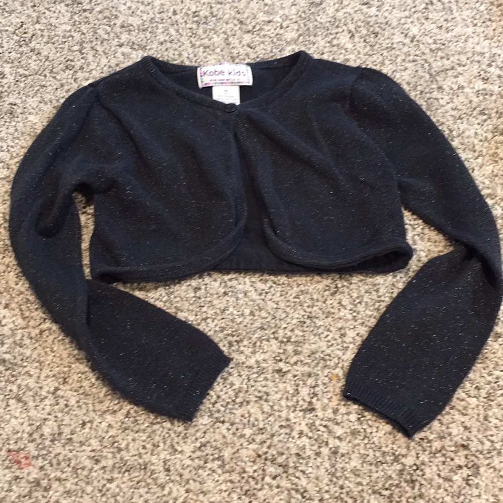 Girls long sleeve black short jacket.